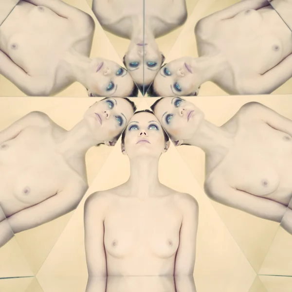 stock image Elegant nude woman in a kaleidoscope