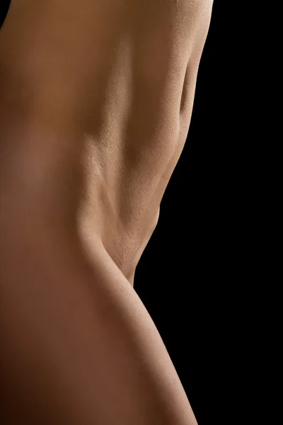 Stock image Naked on a black background