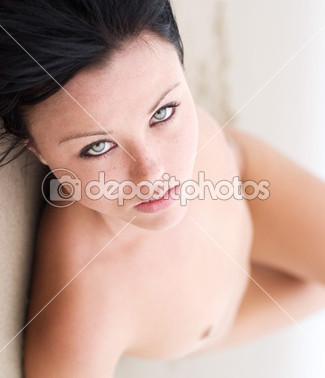 Model reclines on beach