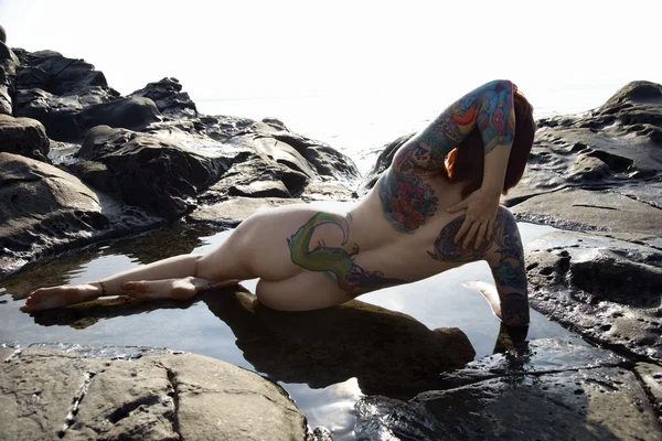 stock image Sexy nude tattooed woman.