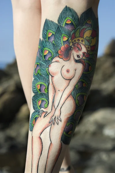stock image Tattooed woman's legs.